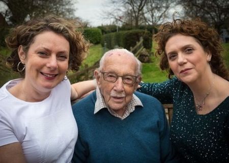 Captain Tom Moore with his two daughters