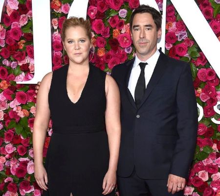 Amy Schumer and Chris Fischer