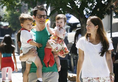 Johnny Knoxville with his wife, Naomi Nelson and their two children