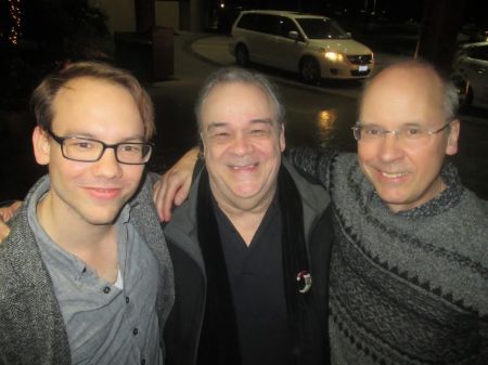 Sam along with his father and Paul

Image Source: Broadway World