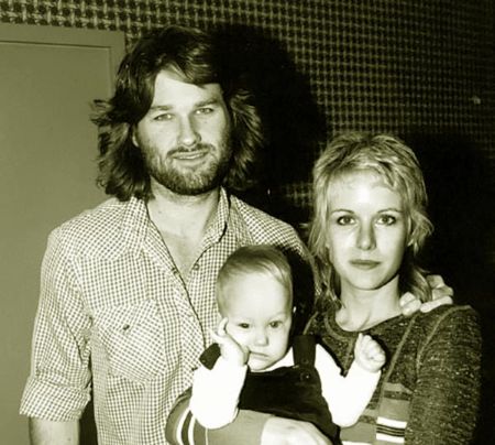 Boston Russell with his parents. Kurt Russell and Season Hubley