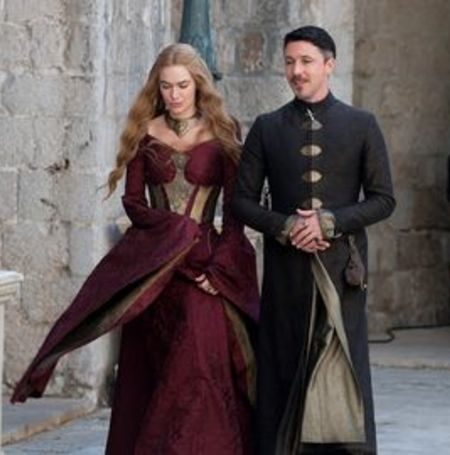 Aidan as Littlefinger in Game of Thrones alongside Lena Headey 

Image Source: Digital Spy