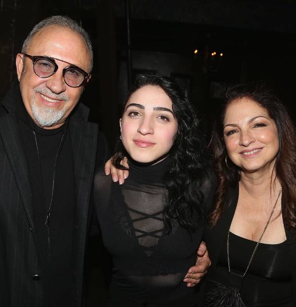 Emily with father Emilio and mother Gloria