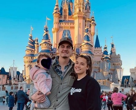 Cade Foehner with his wife and a kid