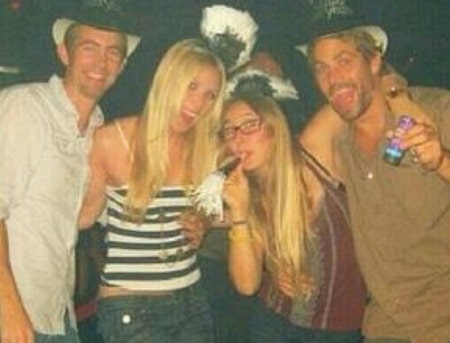 Paul Walker and his wife Rebecca McBrain with friends