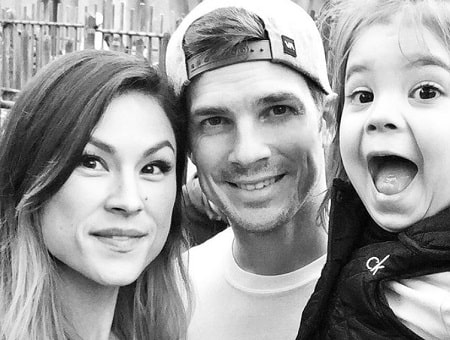 Rick Malambri with his wife and daughter
